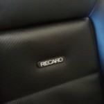 Recaro Seat in Classic Black Carbon Fibre and White Piping